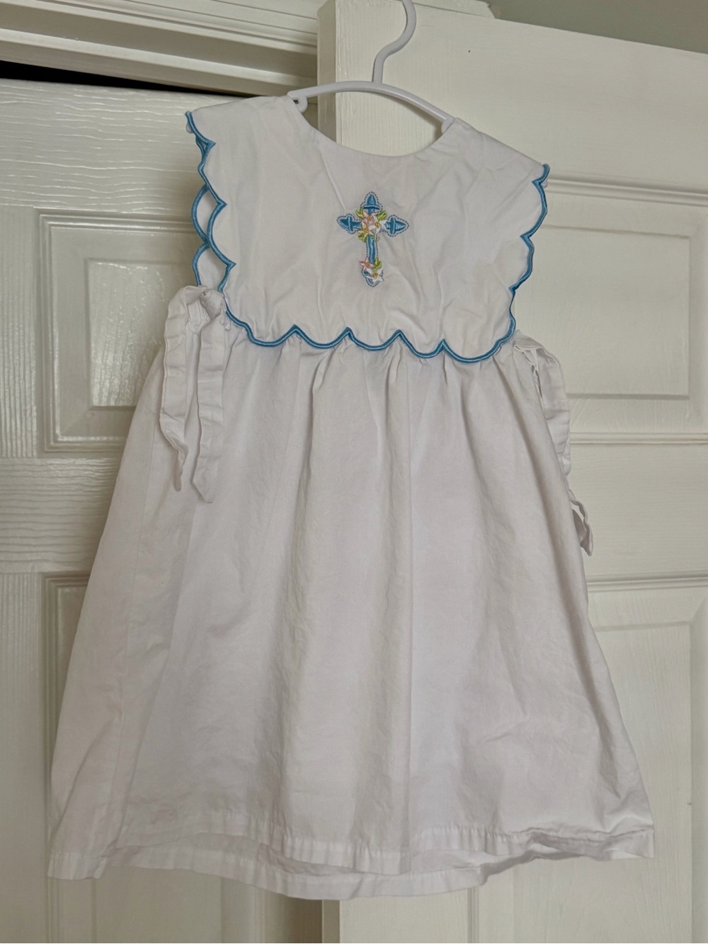 Abby & Evie White Dress with Blue Cross
